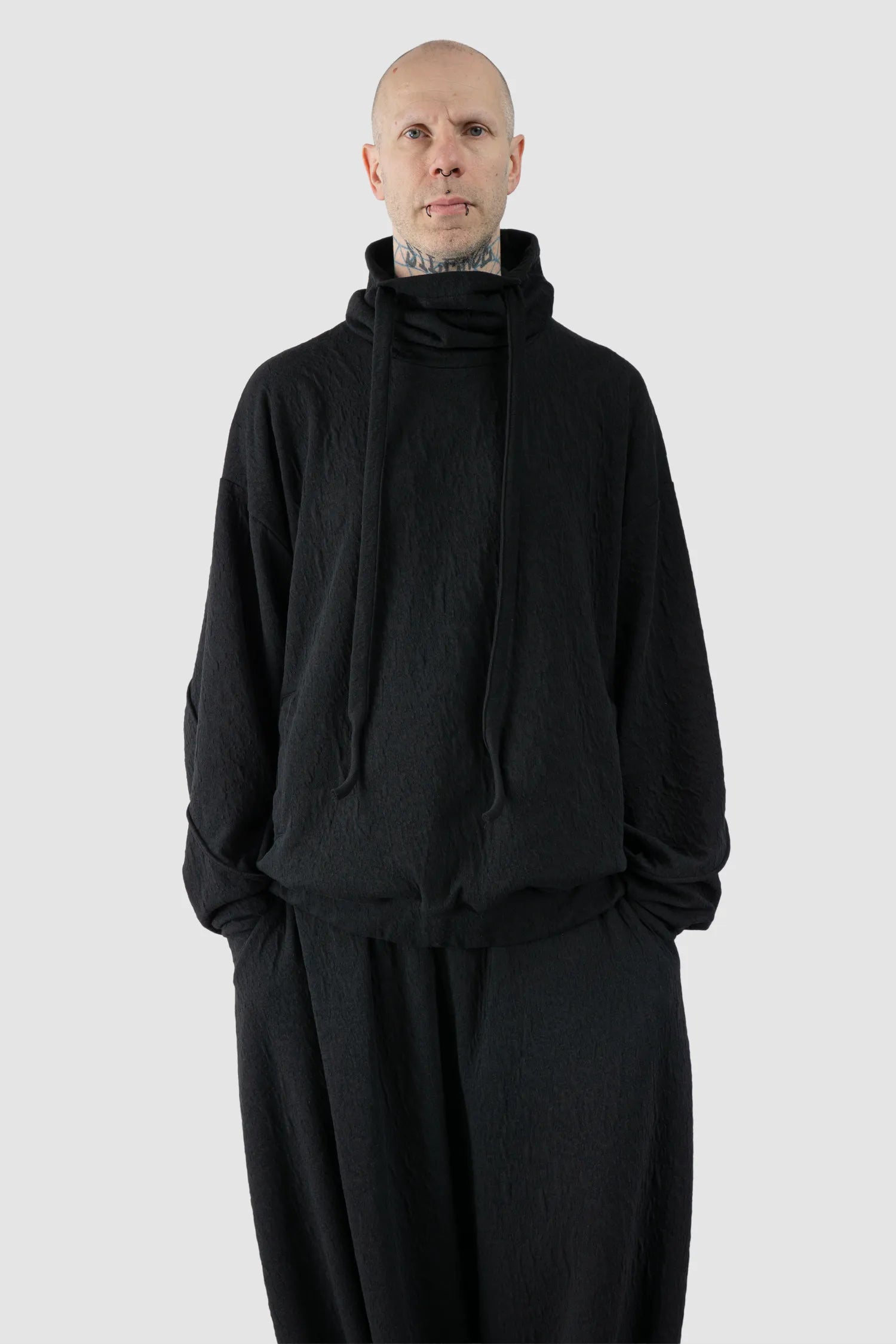 La Haine Inside Us - Men's Black High Neck Embossed Sweater - model relaxed view