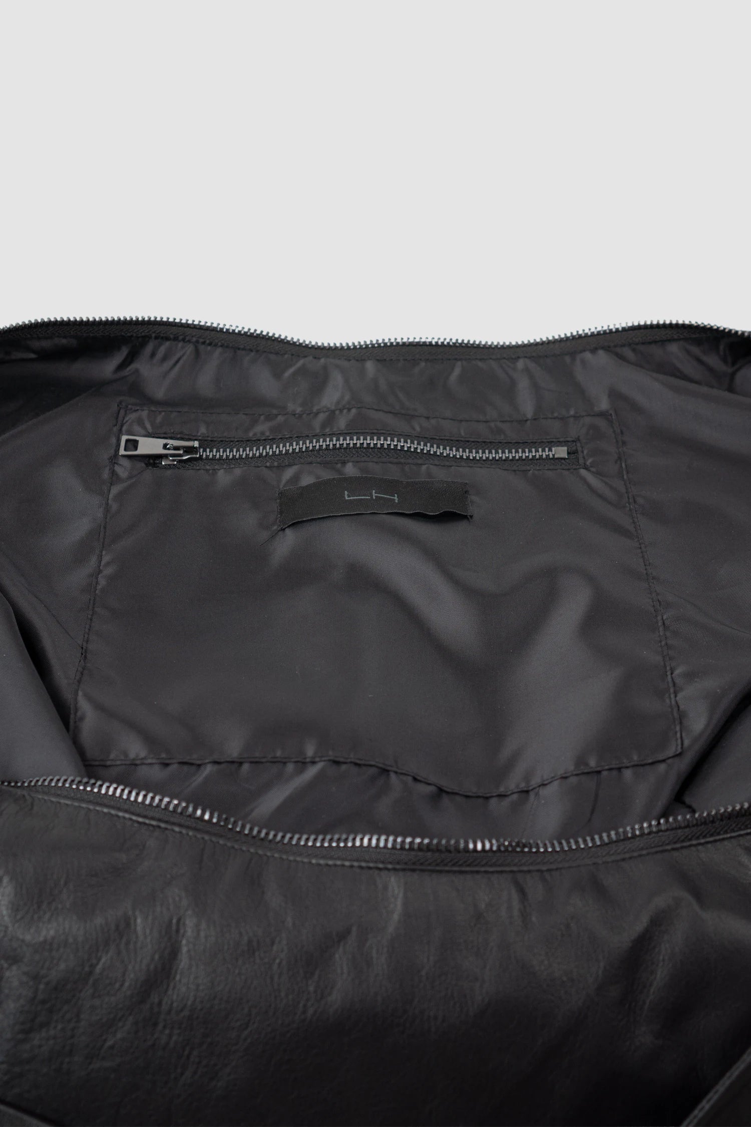 La Haine Inside Us - Men’s Black Nappa Leather Sling Bag inside pocket view