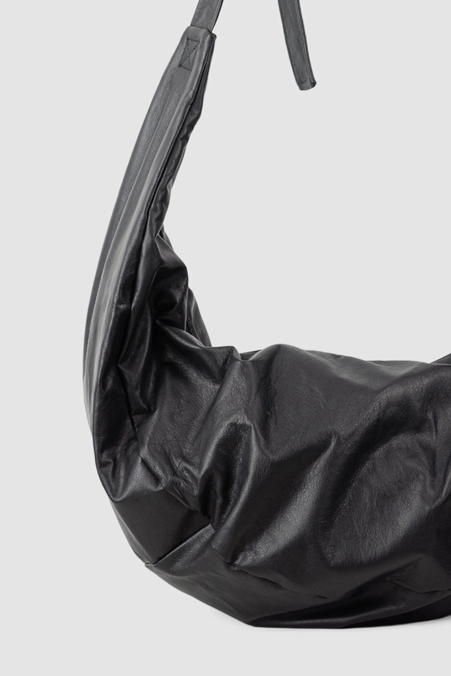 La Haine Inside Us - Men’s Black Nappa Leather Sling Bag left detail view