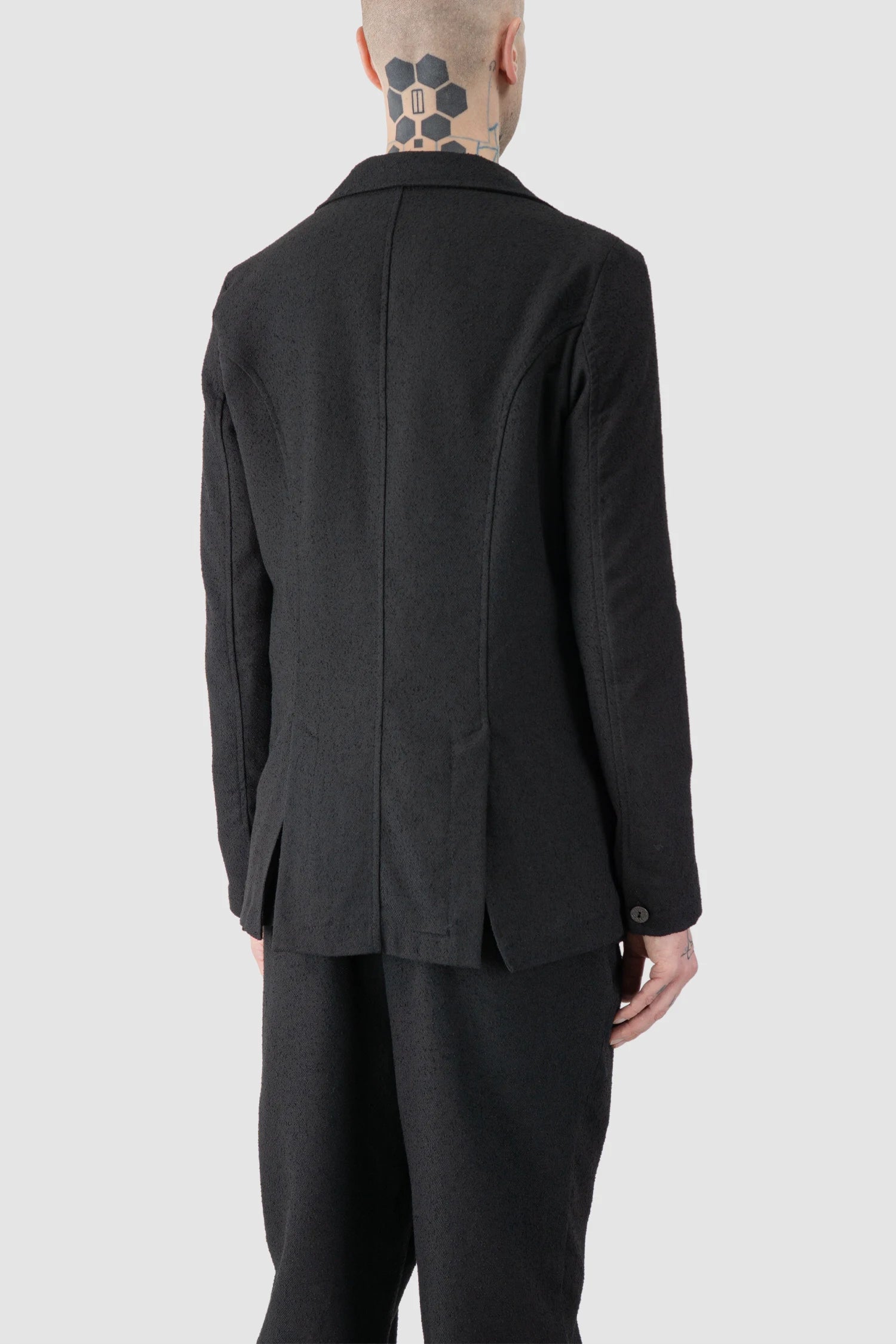 La Haine Inside Us - model back side view of men’s Black Single Button Soft Blazer