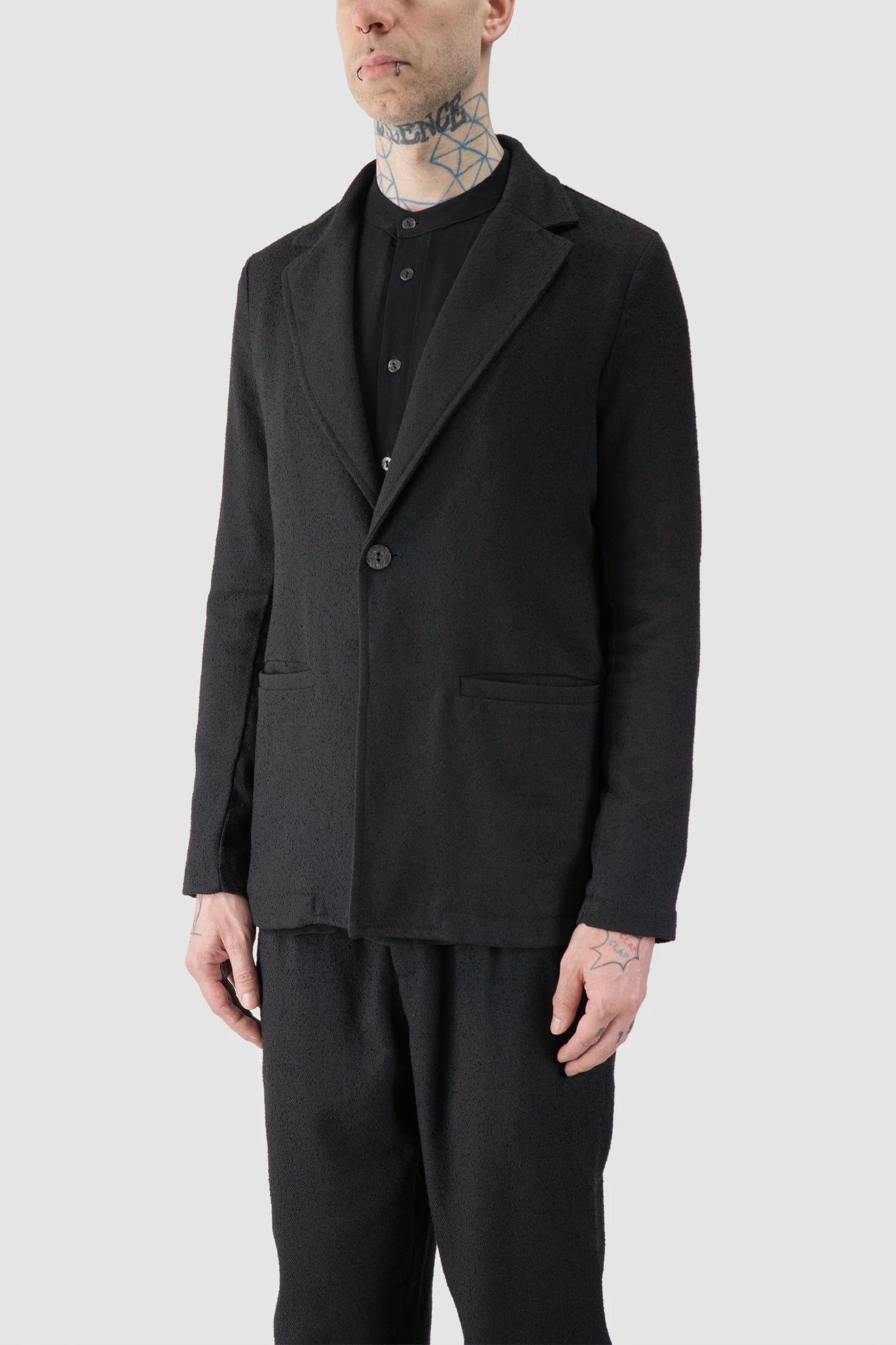 La Haine Inside Us - model front side view of men’s Black Single Button Soft Blazer