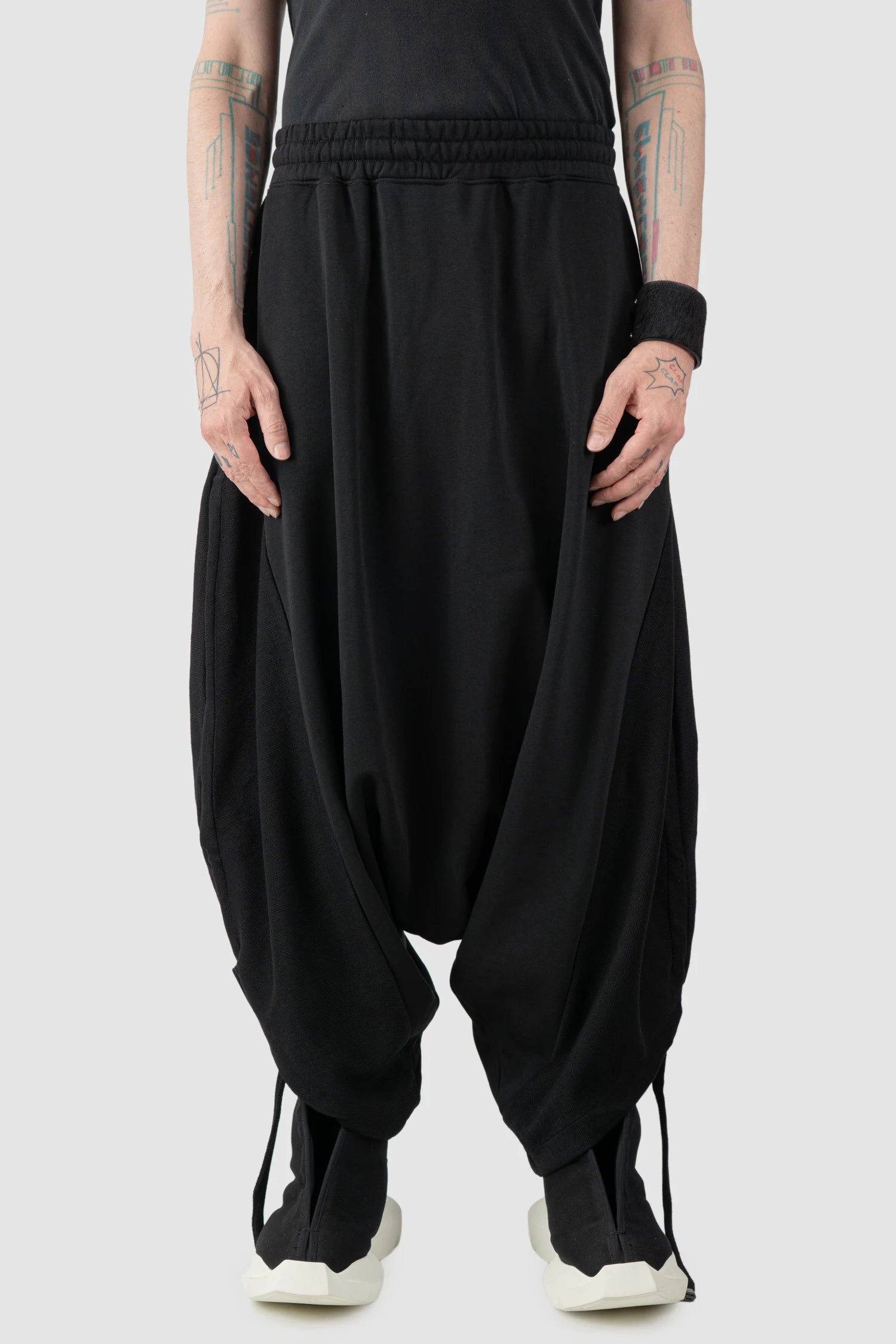 La Haine Inside Us - Men's Black Structured Baggy Cotton Fleece Pants - model front view - MONO-KROM | Gallery