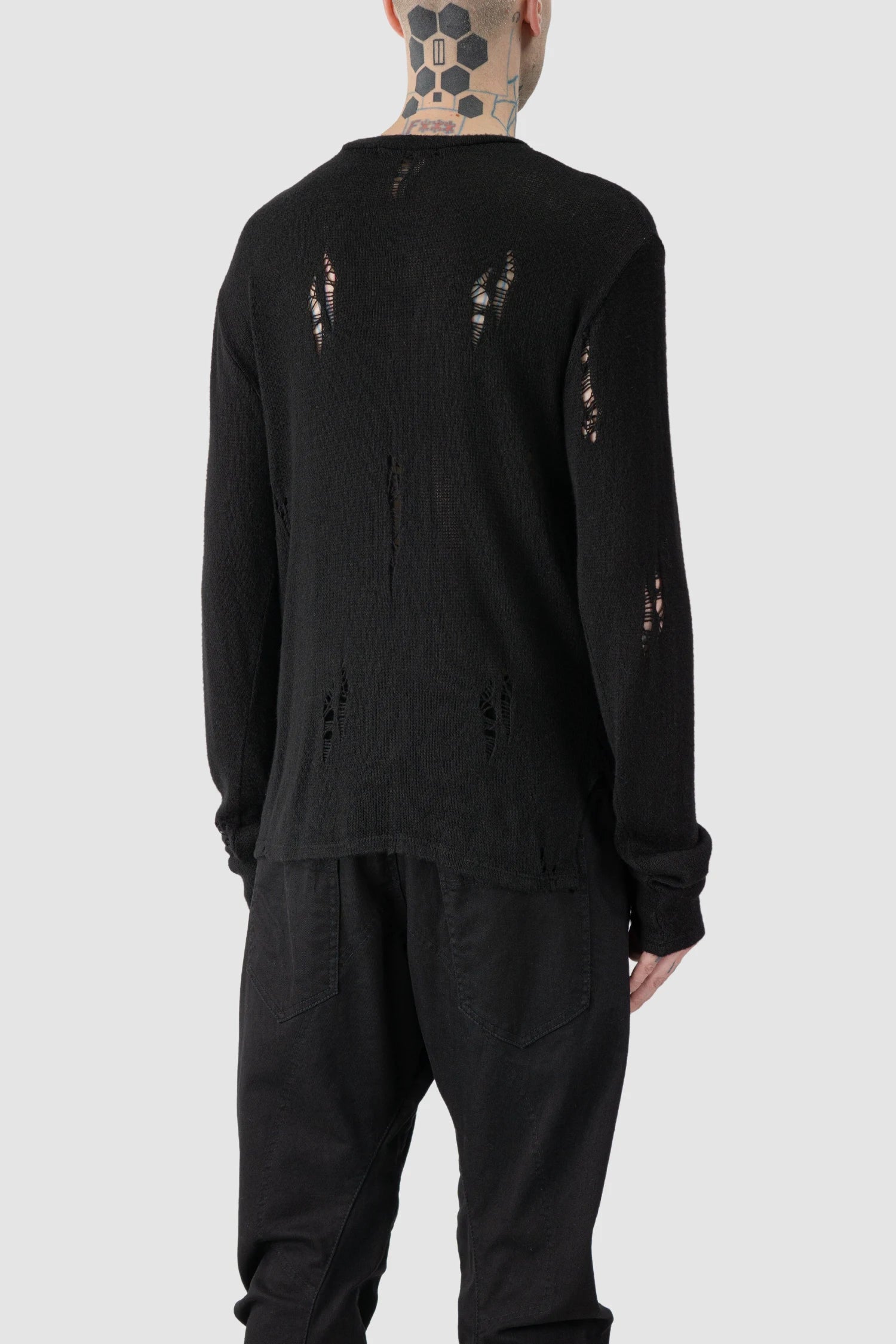 La Haine Inside Us - model back side view of men’s FW25 Black Irregular Destroyed Viscose Blend Knit Sweatshirt