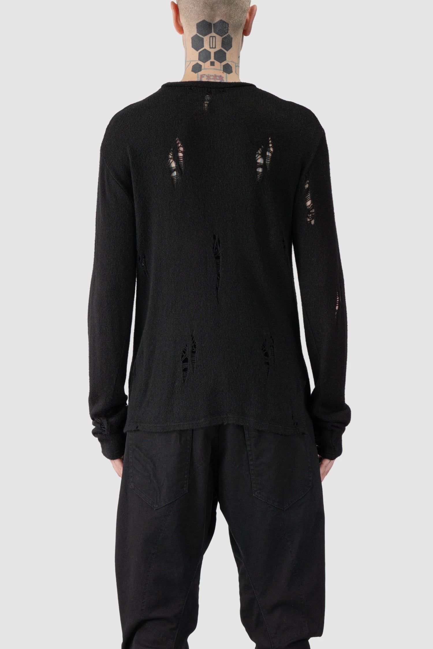 La Haine Inside Us - model back view of men’s FW25 Black Irregular Destroyed Viscose Blend Knit Sweatshirt