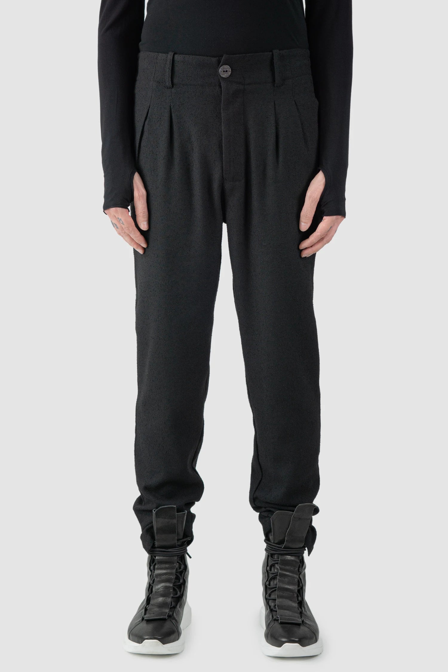 La Haine Inside Us - model front view of men’s FW25 Black Relaxed Soft Bouclé Trousers