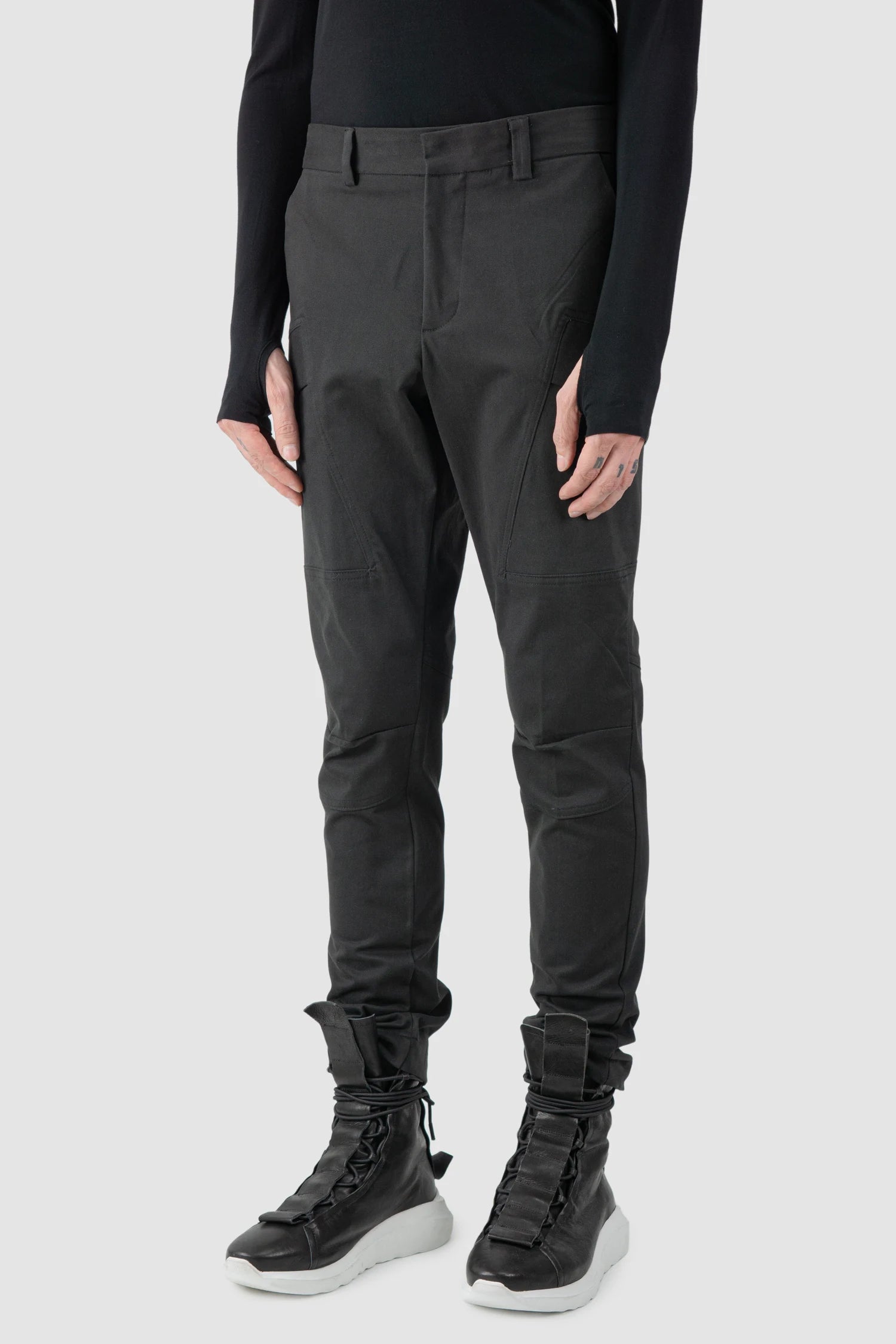 La Haine Inside Us - model front side view of men’s FW25 Black Slim Fit Stretch Cotton Cargo Trousers