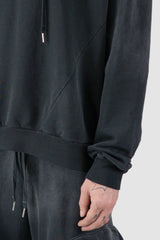 La Haine Inside Us - hem detail view of men’s FW25 Grey Sprayed Degrade Cotton Hooded Sweater