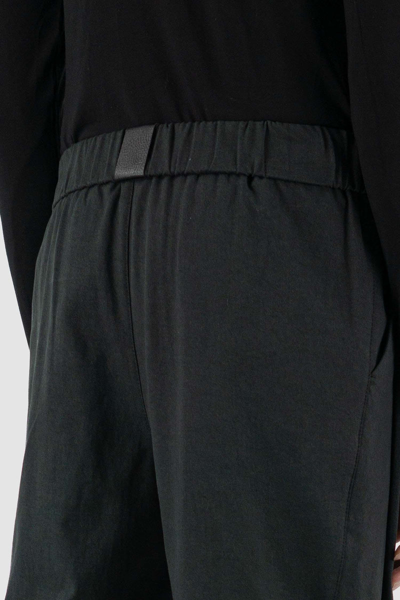 Back View of Comfortable Black Less Pants with UY Label by UY Studio