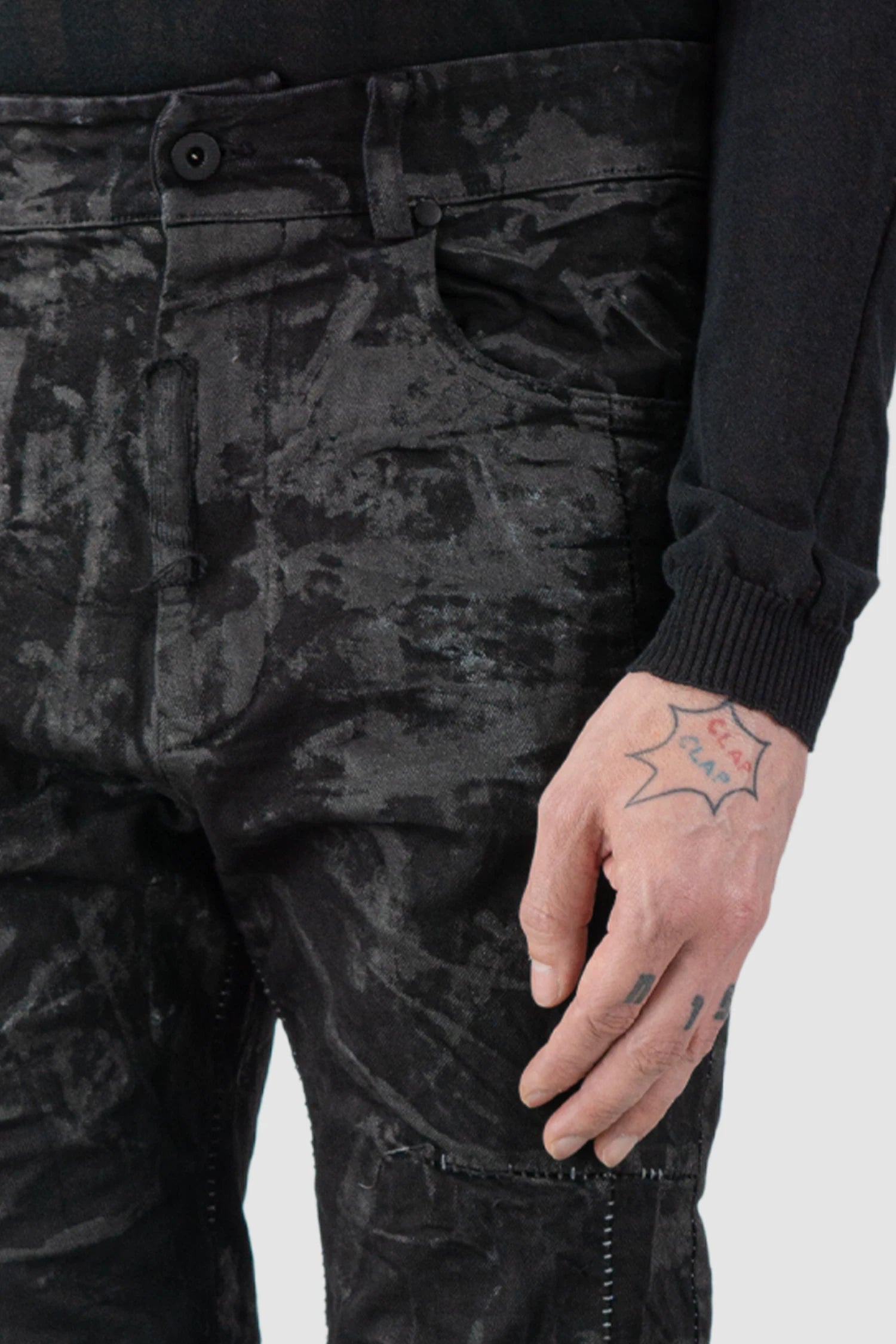 MD75 - model front detail view of men’s Black Sandpaper Coated Stacked Denim Jeans