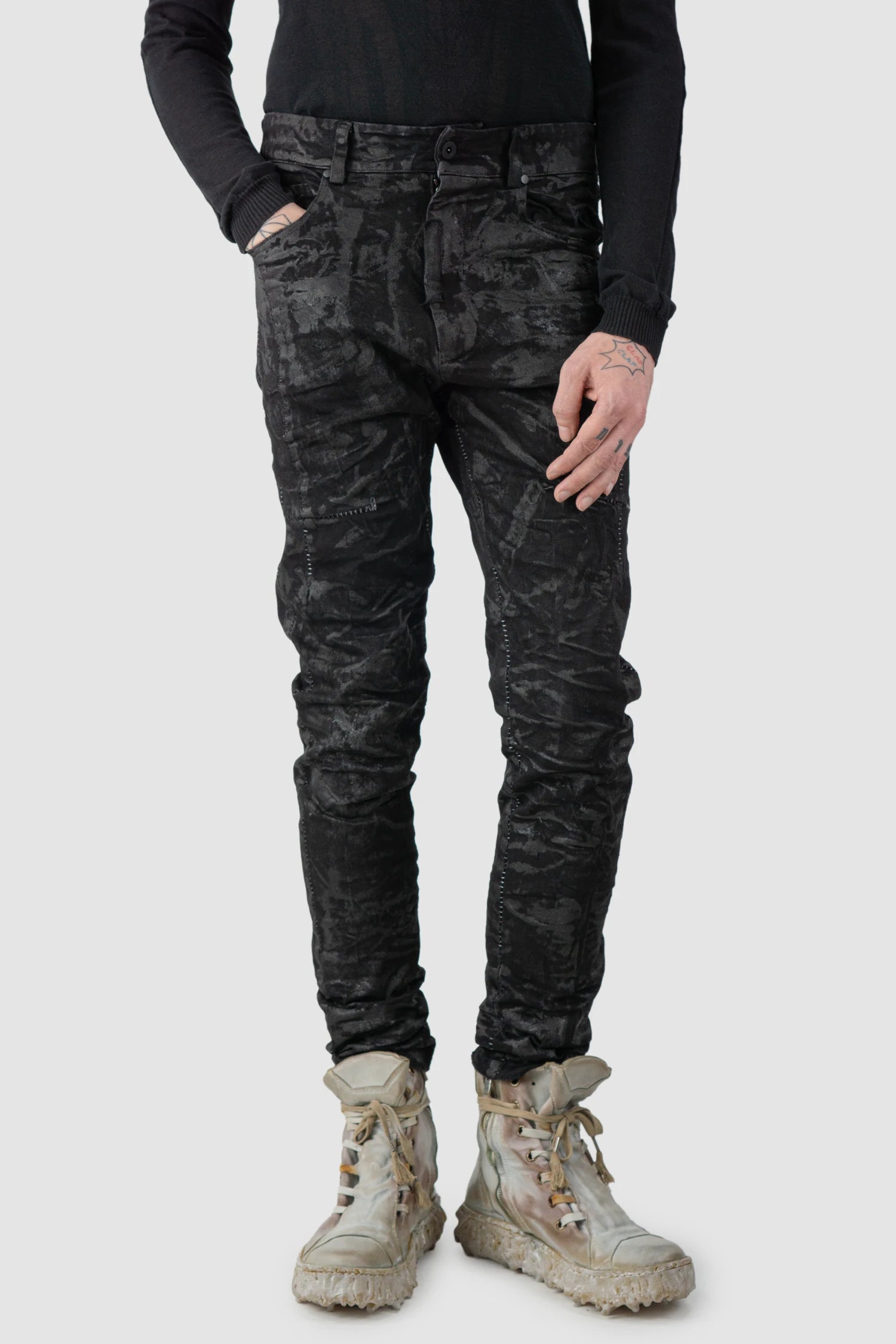 MD75 - model front relaxed view of men’s Black Sandpaper Coated Stacked Denim Jeans