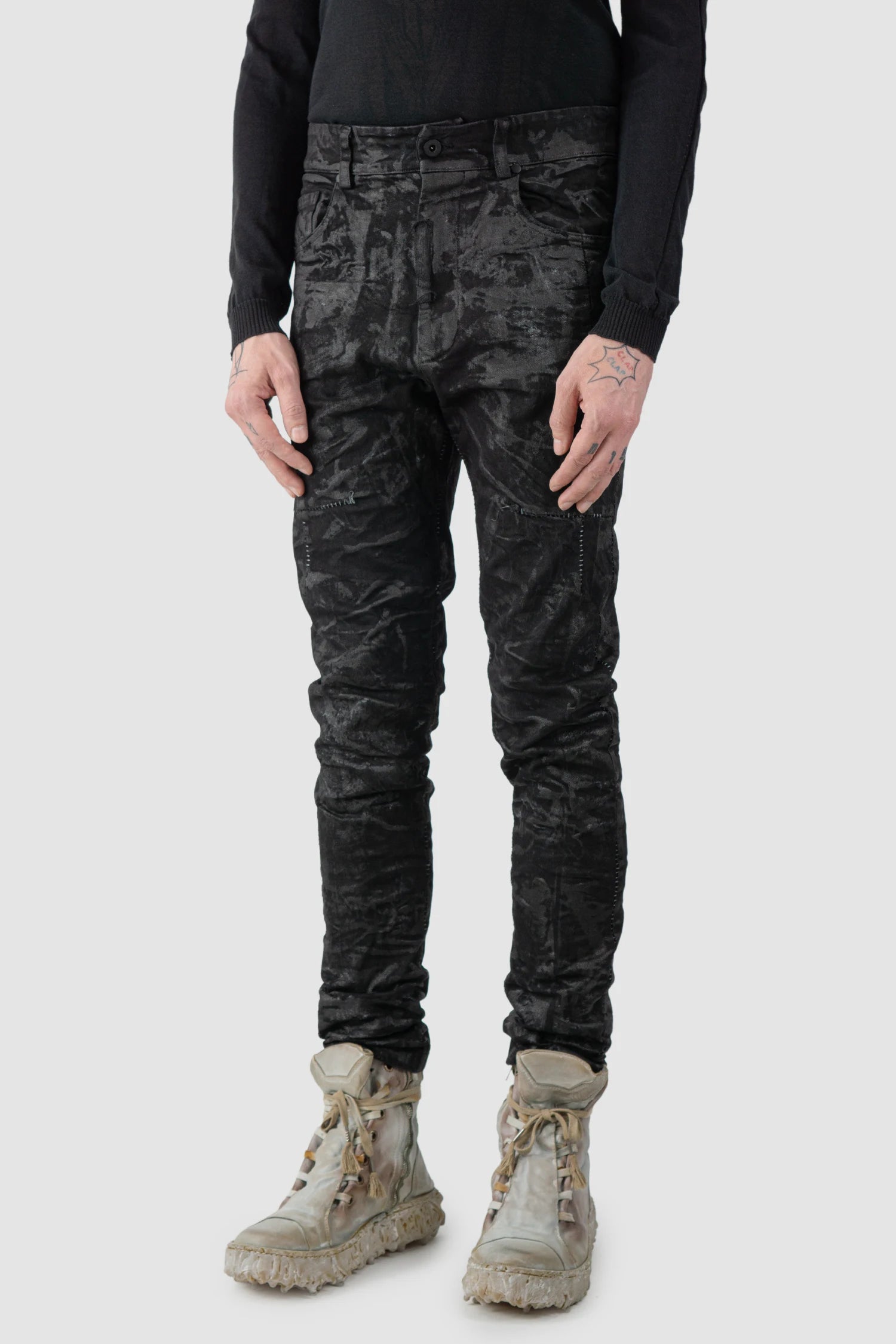 MD75 - model front side view of men’s Black Sandpaper Coated Stacked Denim Jeans