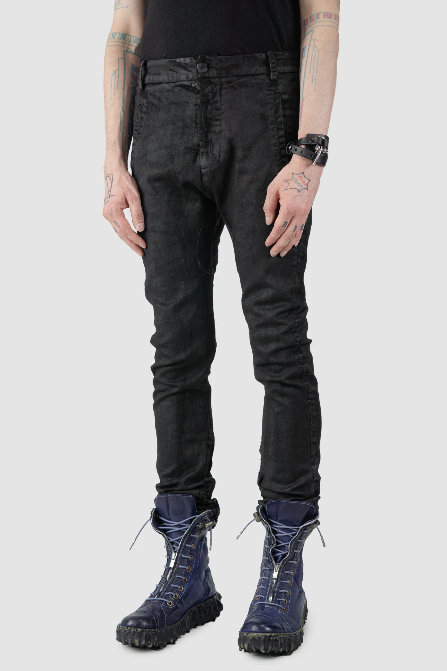 MD75 - model front side view of men’s Black Irregular Heavy Waxed Denim Jeans