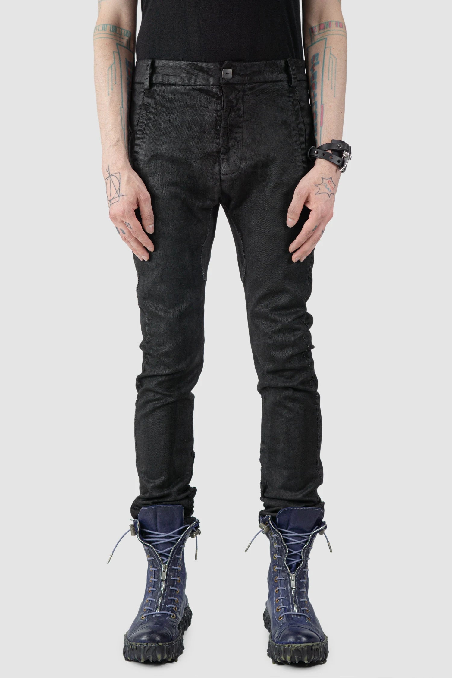 MD75 - model front view of men’s Black Irregular Heavy Waxed Denim Jeans