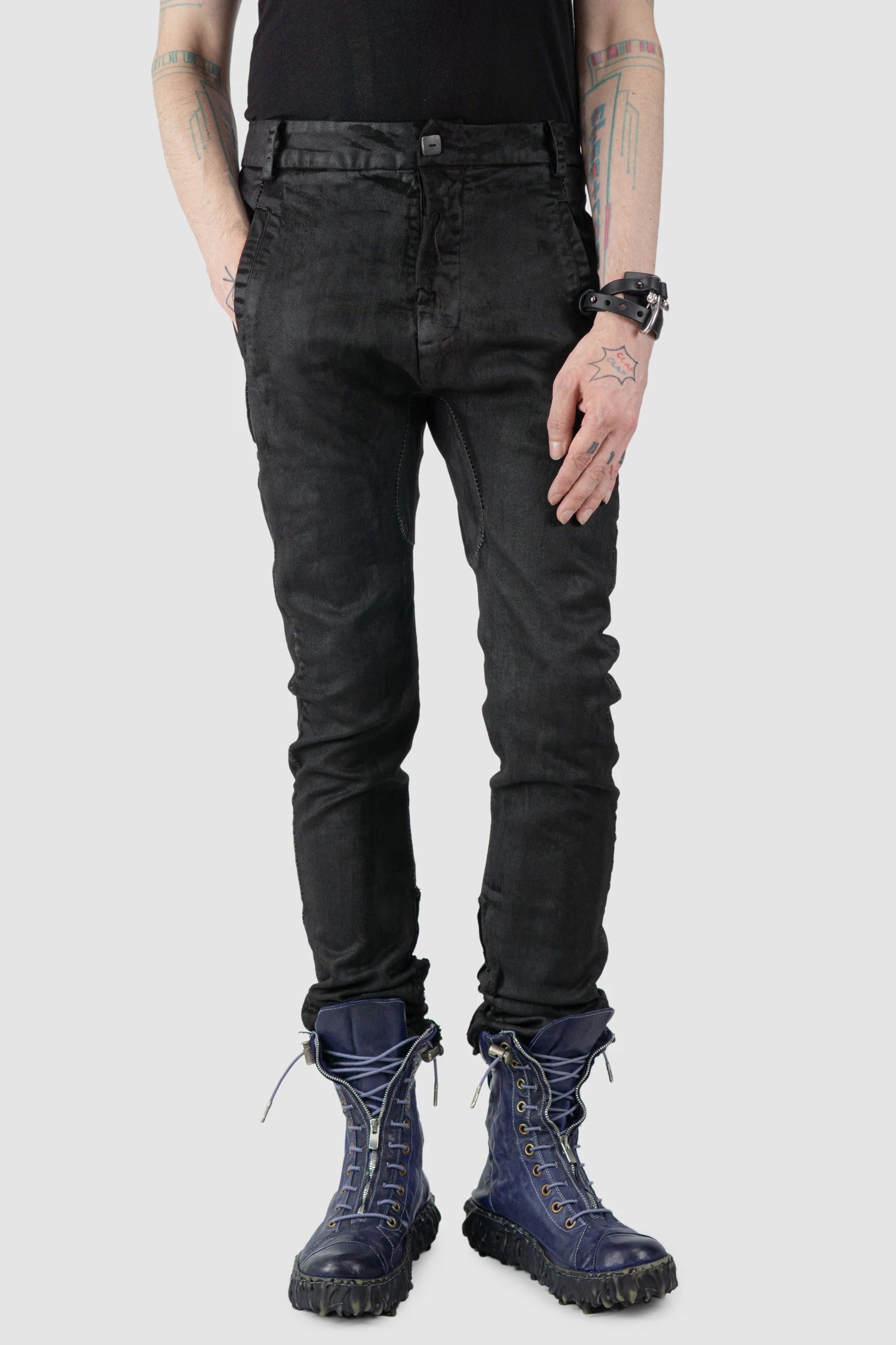 MD75 - model front relaxed view of men’s Black Irregular Heavy Waxed Denim Jeans