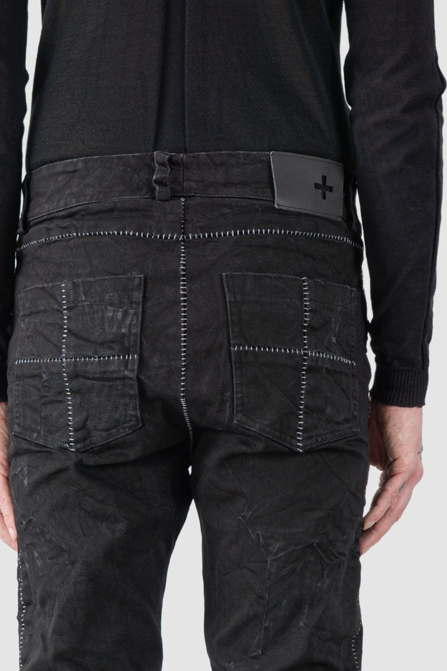 MD75 - back pocket detail view of men’s Black Stone Washed Stacked Denim Jeans