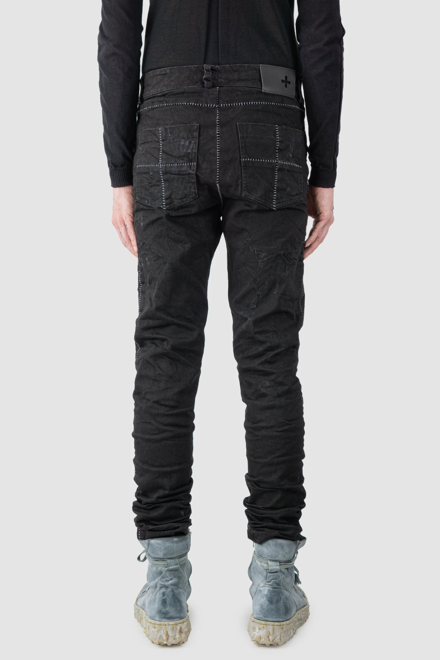 MD75 - model back view of men’s Black Stone Washed Stacked Denim Jeans