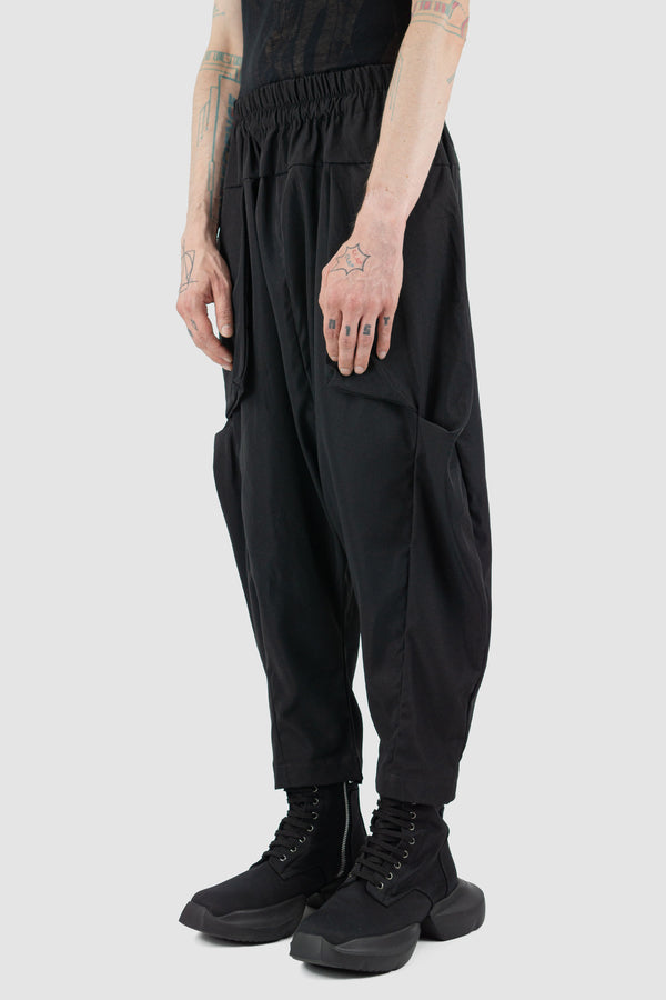 Side view of Black Deep Crotch Pak Pant Posh showing elastic waistband, XCONCEPT