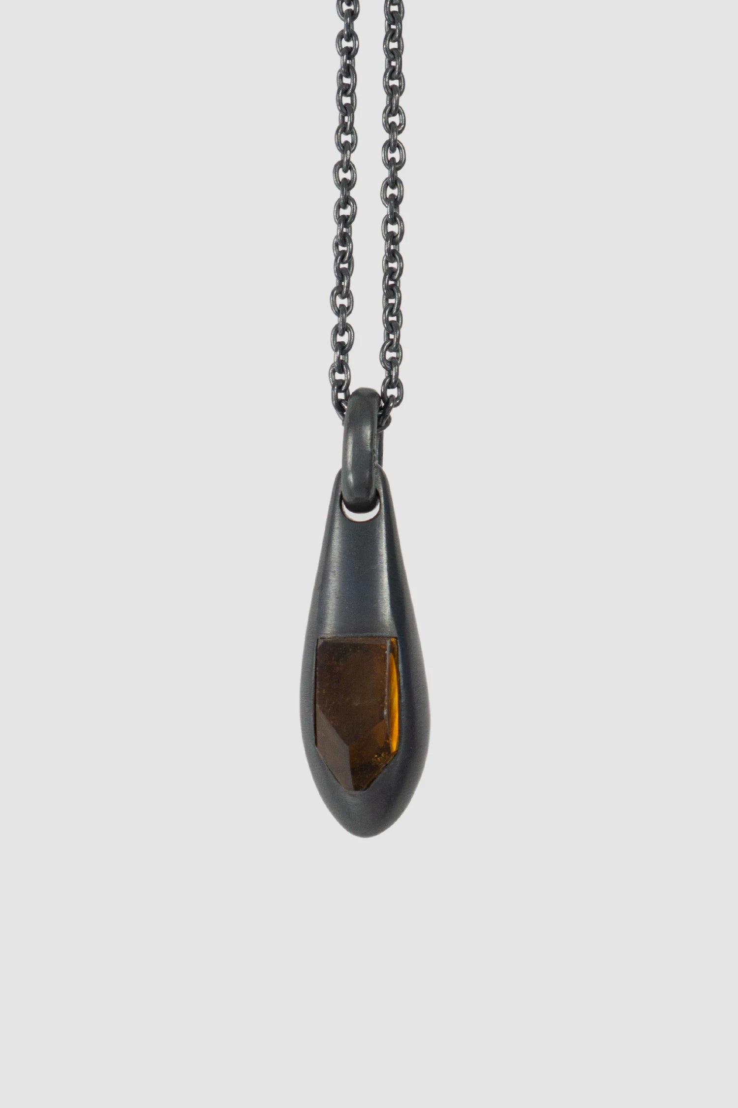 Parts of Four - Black Sterling Silver Amber Chrysalis Necklace - detail view - MONO-KROM Gallery