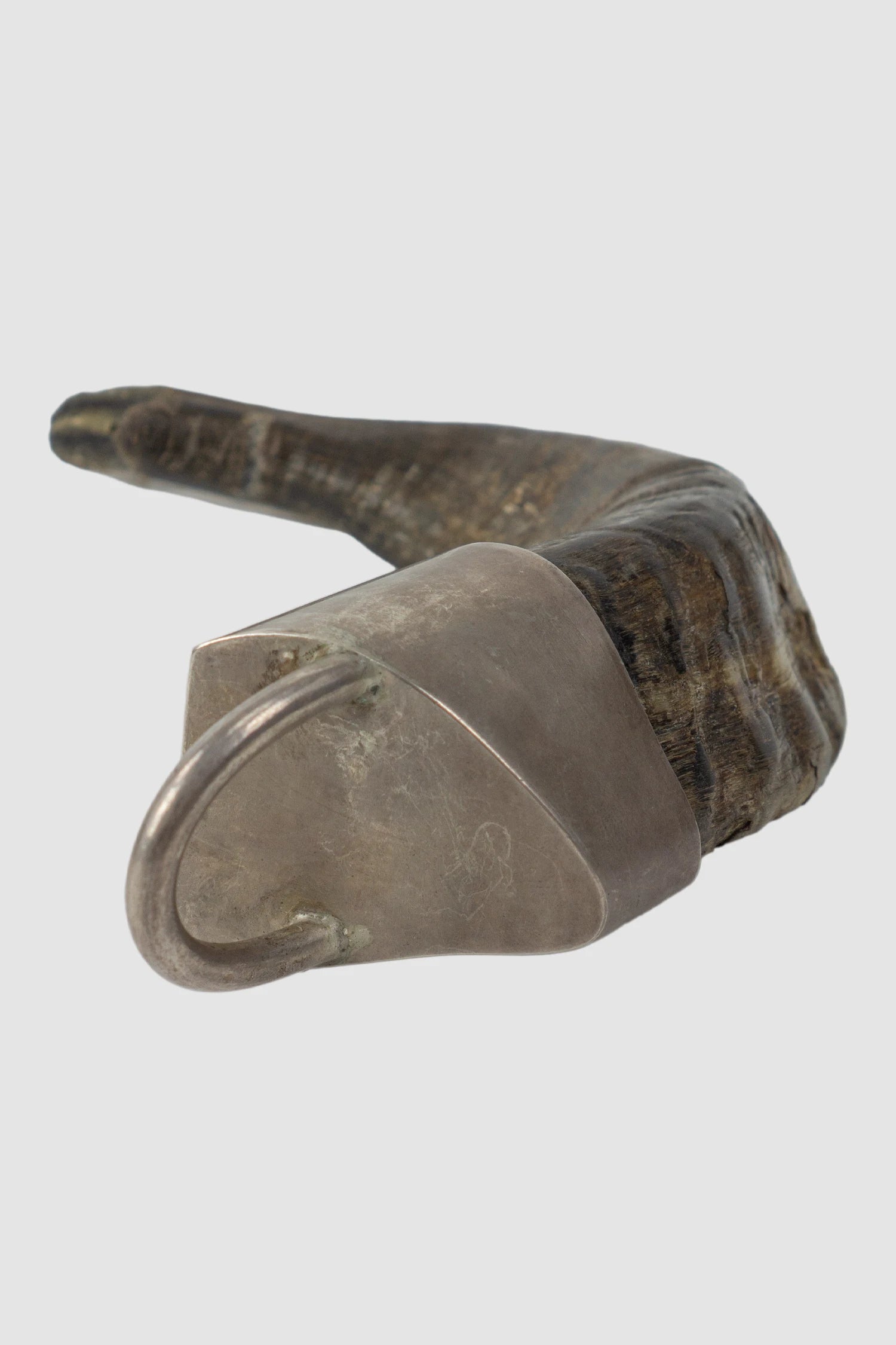 Parts of Four - Sterling Silver Horn Charm - lying left view