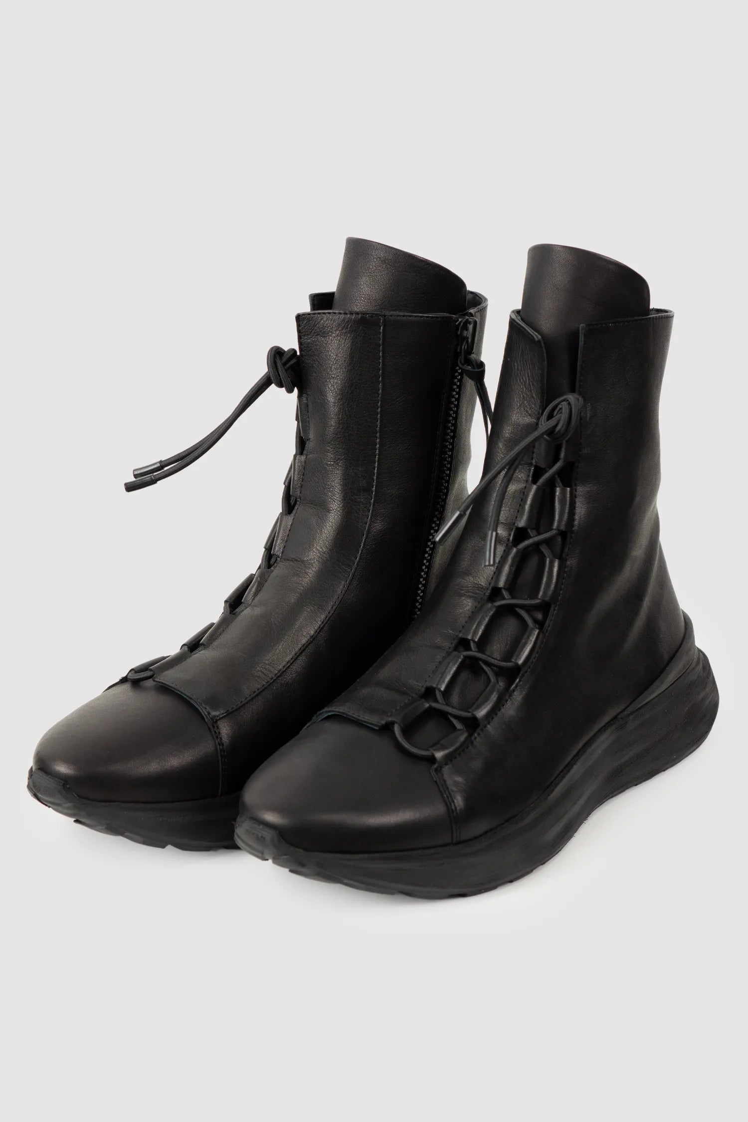 Puro Secret - Black Offset Leather High-Top Sneakers - Pair front left view - MONO-KROM | Gallery
