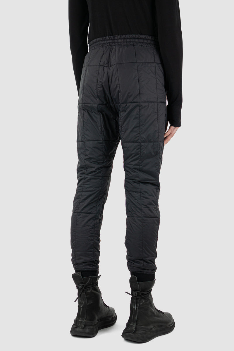 Back view of Black Quilted Slim Pants for Men with recycled polyamide and merino wool, FW23, NOMEN NESCIO
