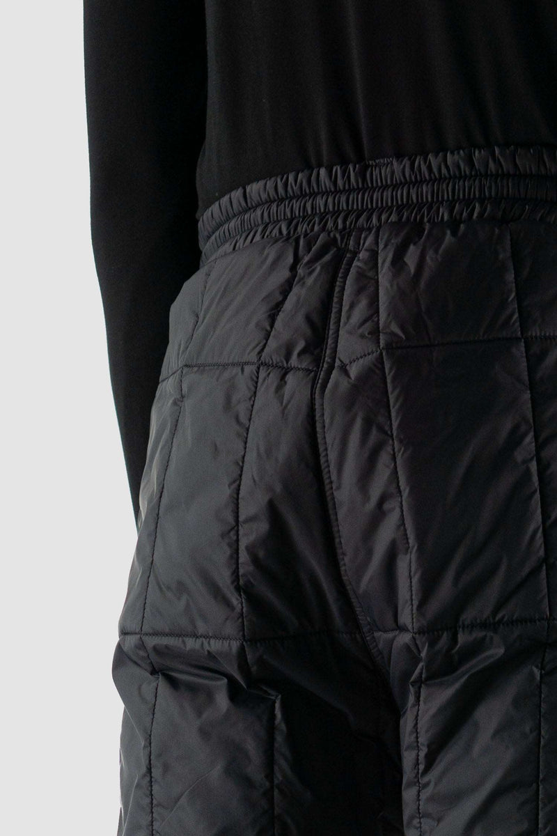 Close up view of Black Quilted Slim Pants for Men with recycled polyamide and merino wool, FW23, NOMEN NESCIO