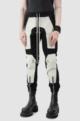 Rick Owens - Black Leather Patch Larry Cargo Joggers FW22 "Strobe" - model front side view - MONO-KROM | Gallery