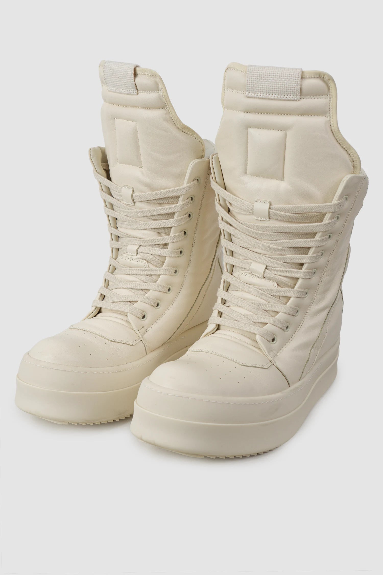 Rick Owens - Milk Mega Geobasket Sneakers FW24 "Porterville" - pair front left view - MONO-KROM | Gallery