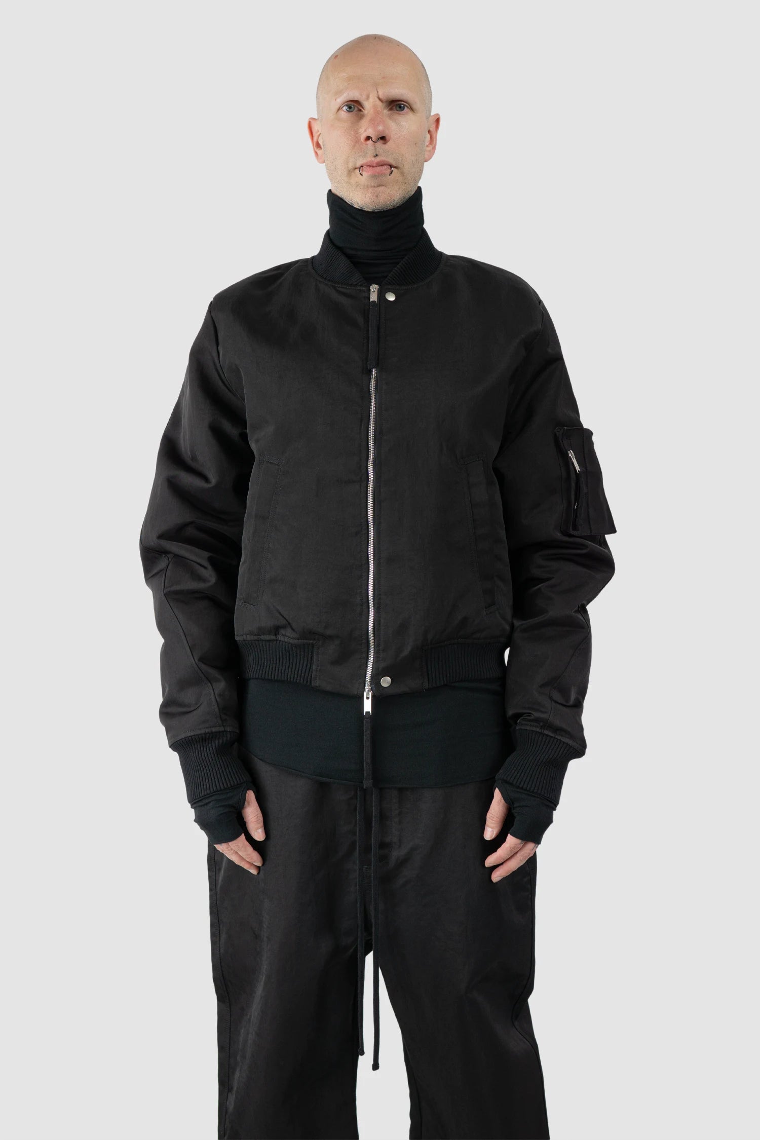 Thom Krom – Men's Black Recycled Tech Bomber Jacket - model front view - MONO-KROM | Gallery