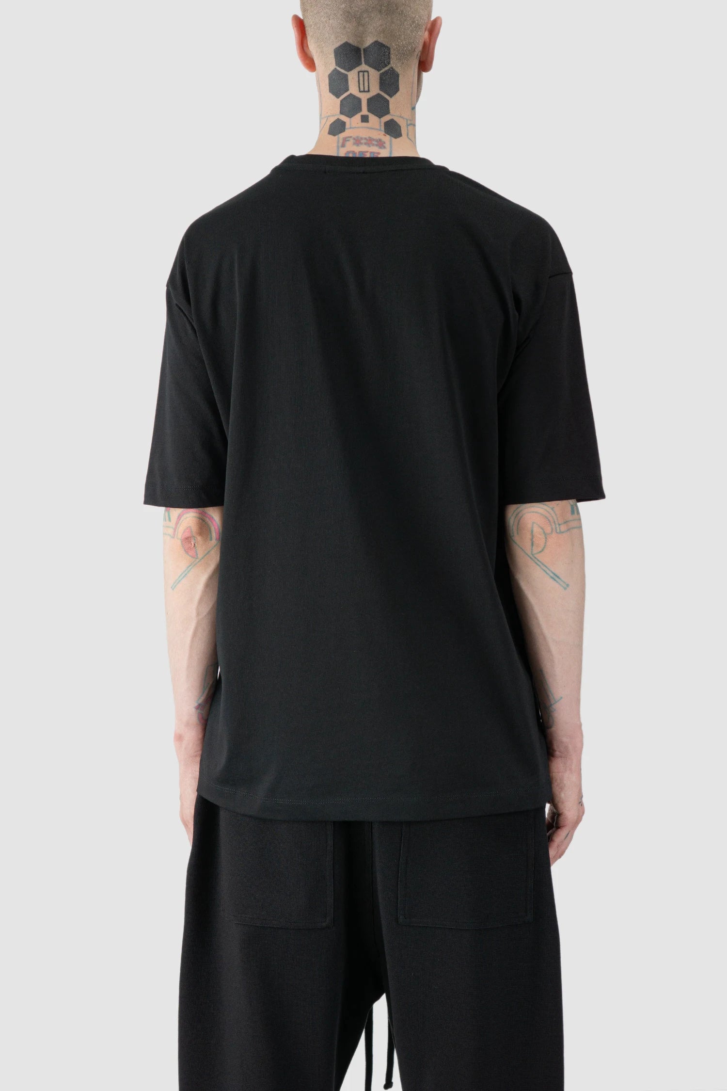 Thom Krom - model back view of black Loose Fit Cotton T-Shirt with Patch - M-TS-876