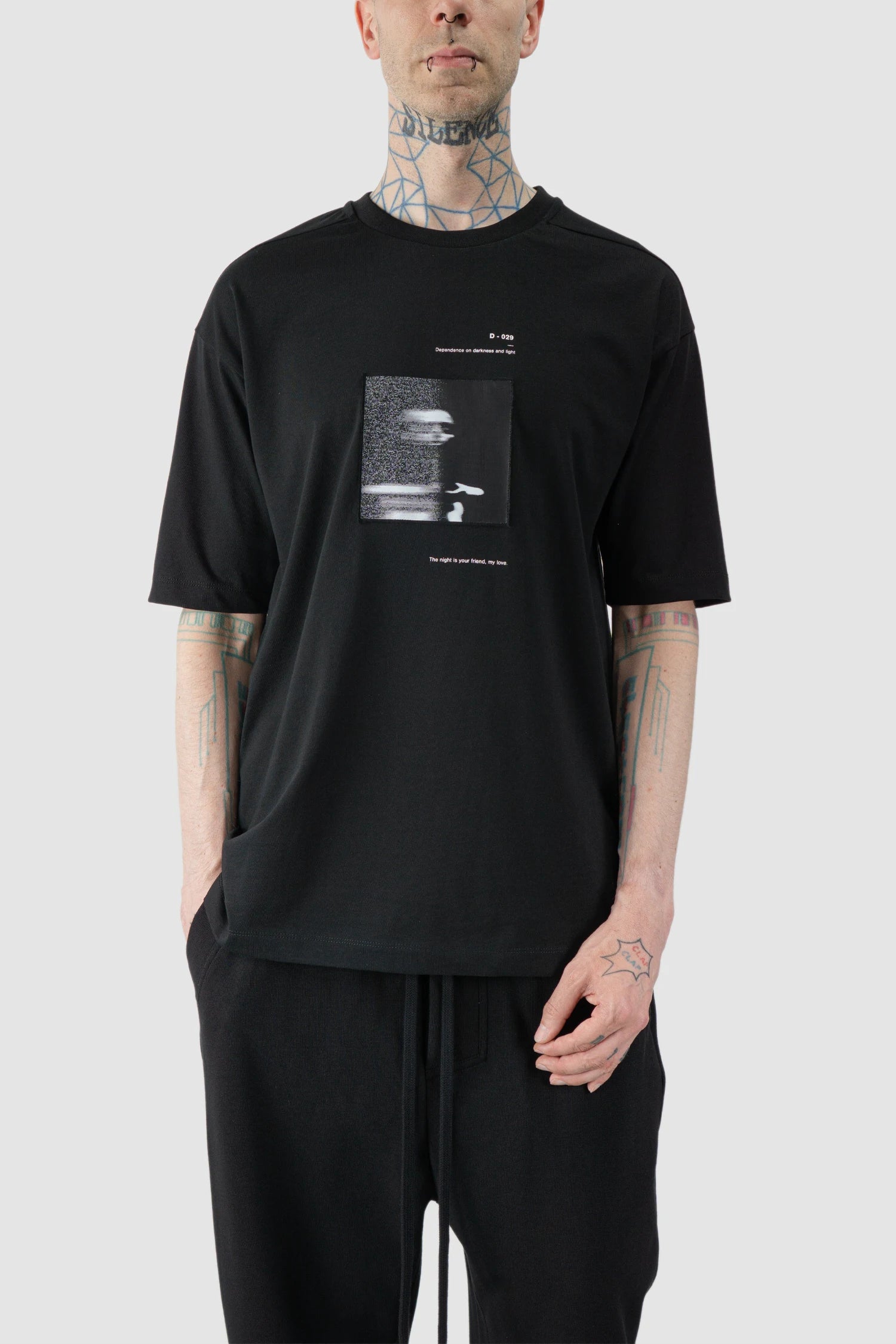 Thom Krom - model front relaxed view of black Loose Fit Cotton T-Shirt with Patch - M-TS-876