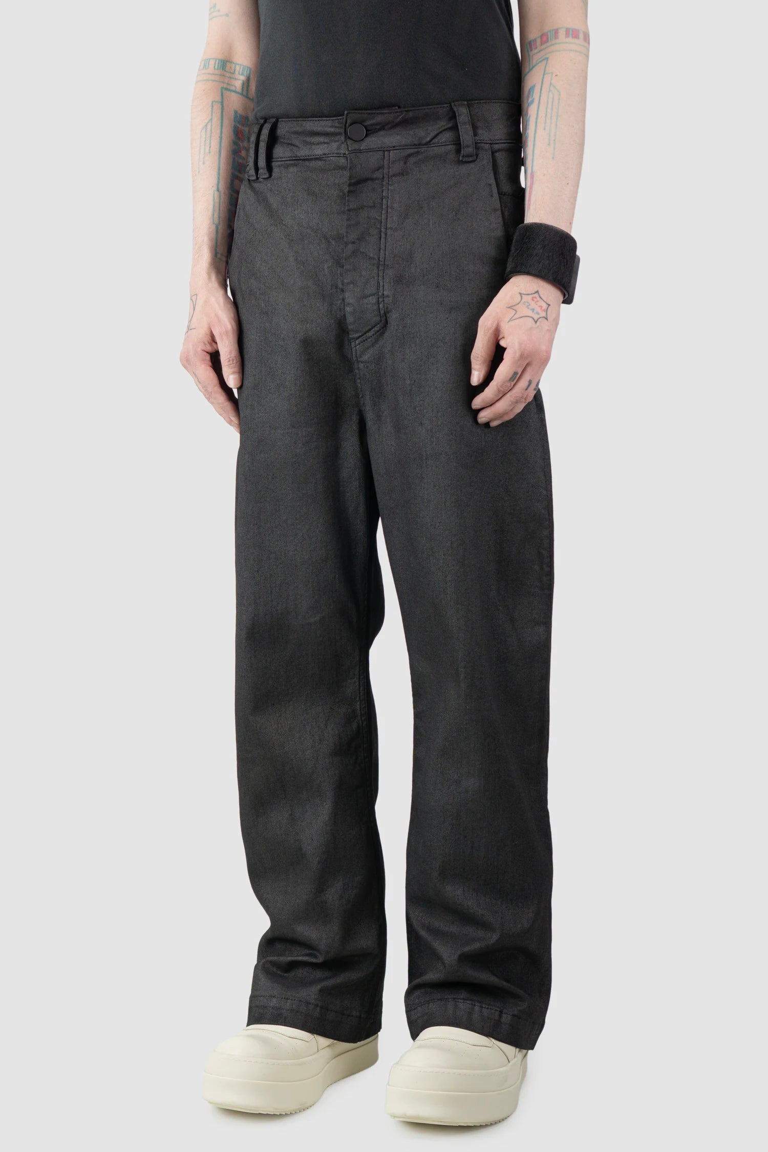 Thom Krom – Men's Black Coated Wide Leg Denim Jeans - model side view - MONO-KROM | Gallery