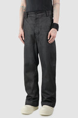 Thom Krom – Men's Black Coated Wide Leg Denim Jeans - model side view - MONO-KROM | Gallery