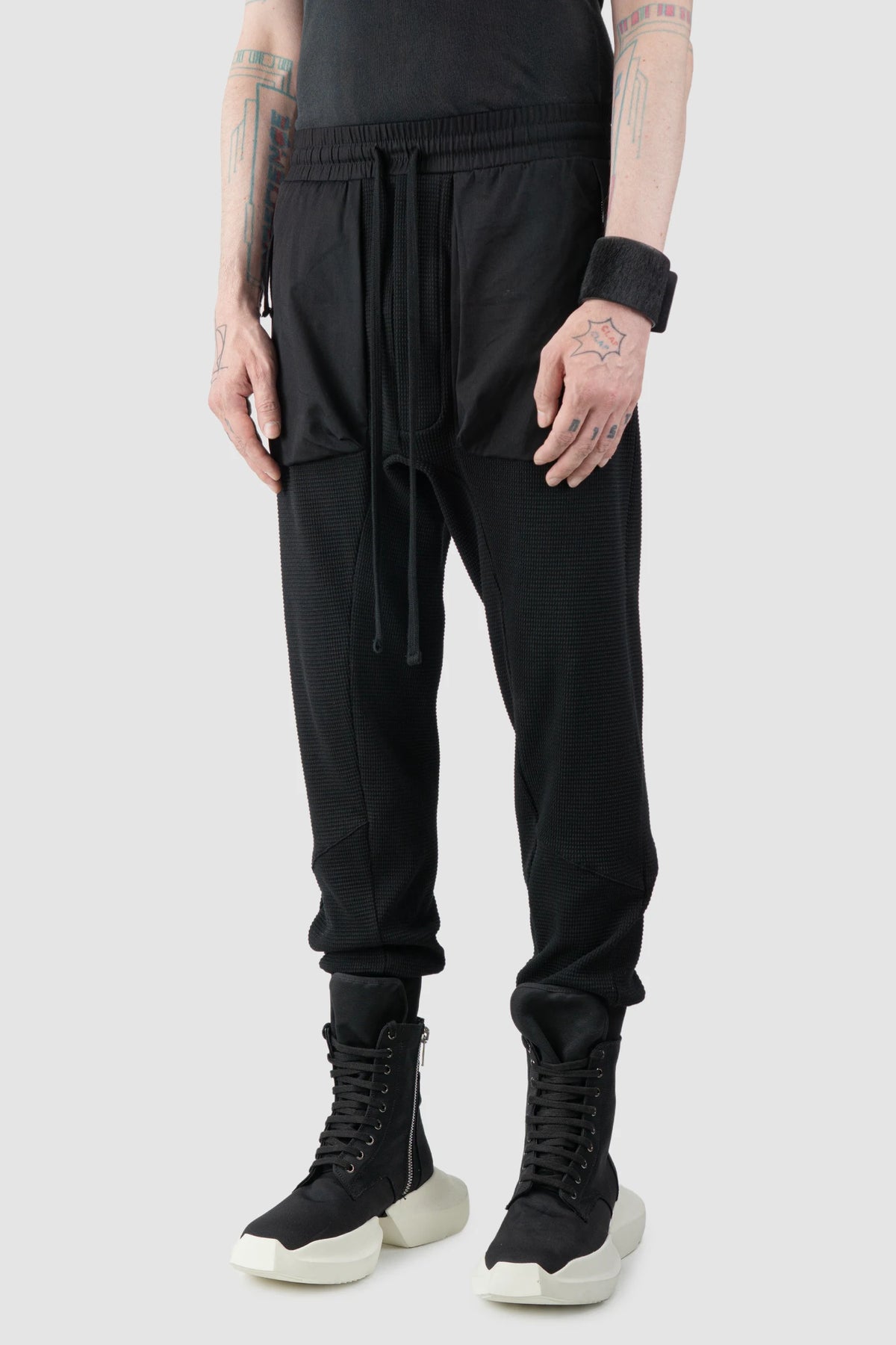 Thom/Krom - Men's Black Cotton Cargo Joggers - model front side view - MONO-KROM | Gallery