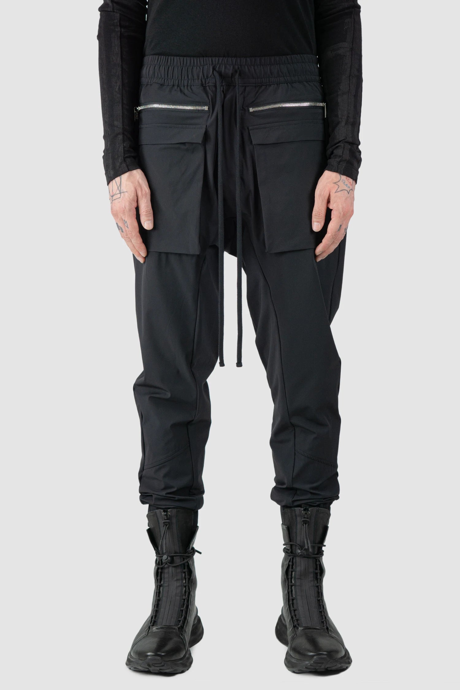 Thom Krom - model front view of men’s FW25 Black Front Pocket Woven Stretch Cargo Trousers - M-P-27