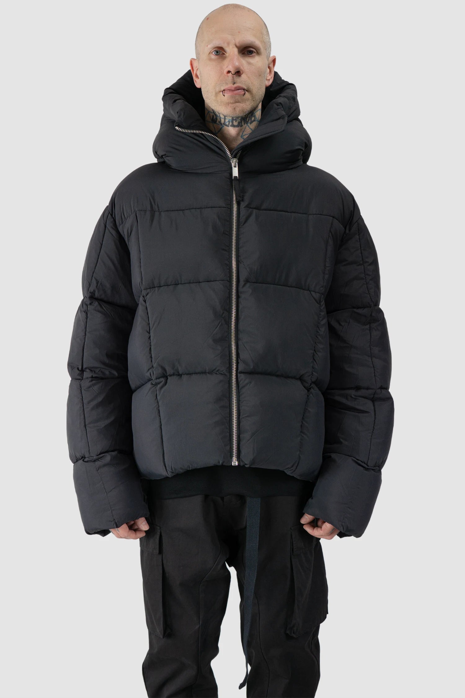 Thom Krom - model front view of men’s Black Guilted Nylon Puffer Jacket M-J-78