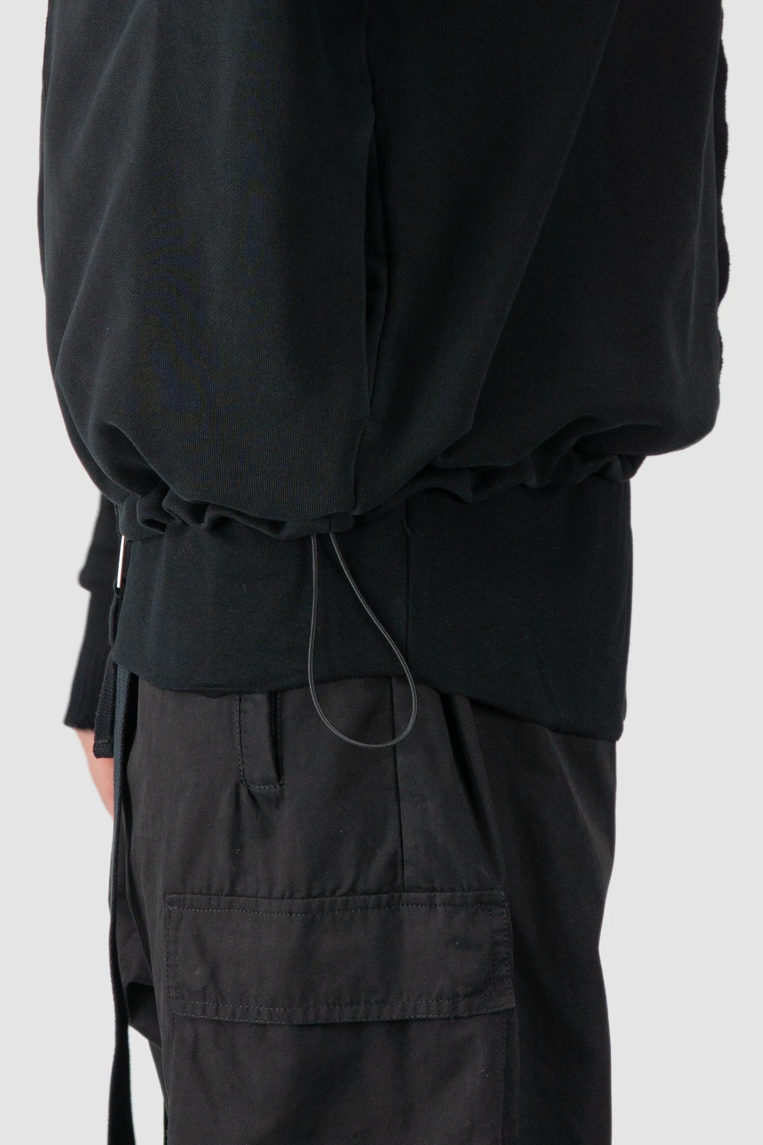 Thom Krom - model hem detail view of men’s Black Heavy Cotton Hoodie with Two Way Zipper M-SJ-690