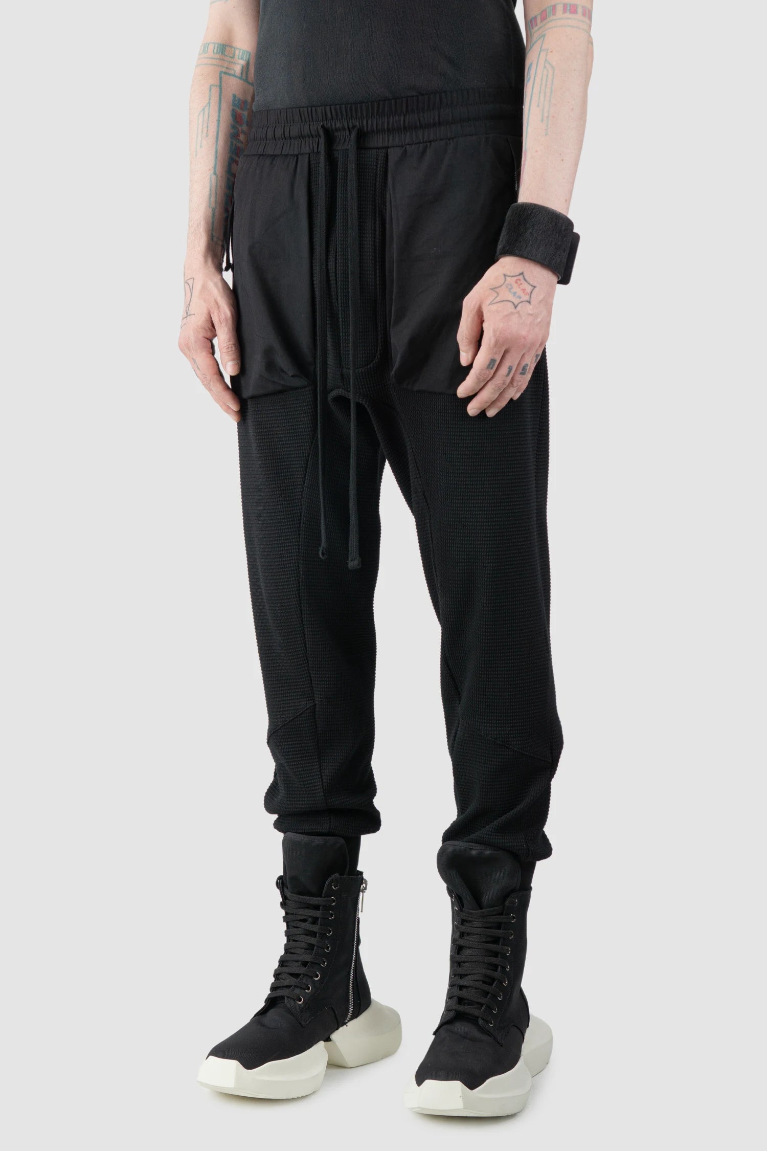 Thom Krom – Men's Black Waffle Cotton Cargo Trousers - model front side view