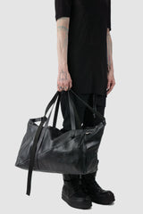 Werkschwarz - model hand carry view of black Soft Cow Leather Weekender Bag Cabin 1P