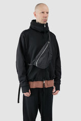 Werkschwarz - model side view of men’s Black Cross Body Waist Bag Nylon 1