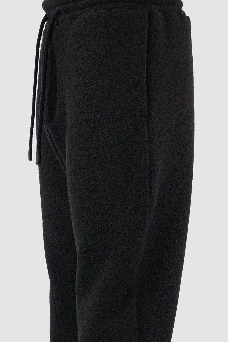 Detail view of Black Woolen Sweatpants for Men with elastic waistband and recycled wool, FW23, NOMEN NESCIO