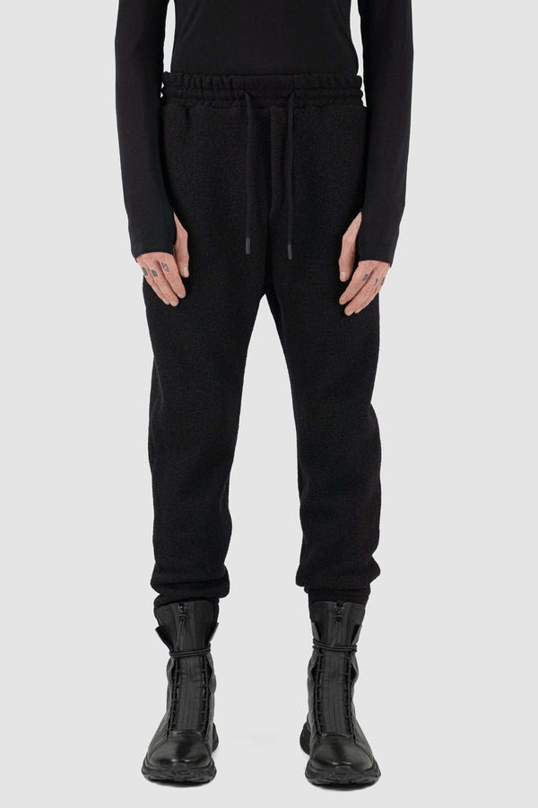Front view of Black Woolen Sweatpants for Men with elastic waistband and recycled wool, FW23, NOMEN NESCIO